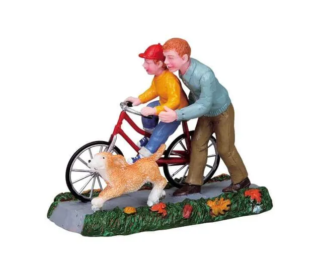 lemax-learning-to-ride-figurine-enfant-v-lo-village-miniature image 1