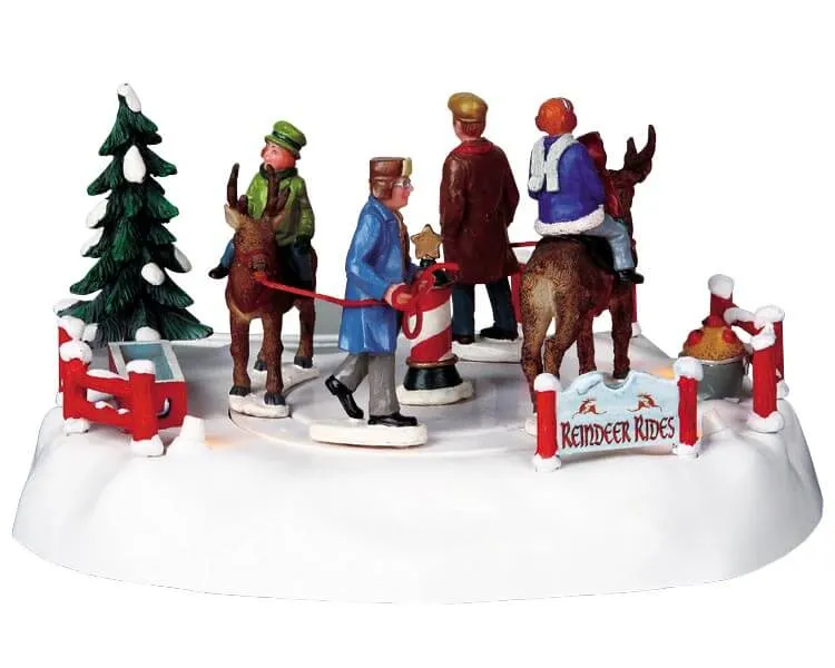 lemax-reindeer-rides-man-ge-rennes-village-de-no-l image 1